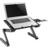 Adjustable stand for a laptop with a surface for a mouse.